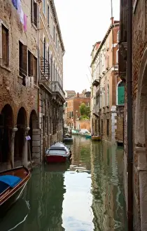Inti St Clair Prints: Venice, Veneto, Italy - Buildings surrounded by the canals in Venice, Italy. Boats