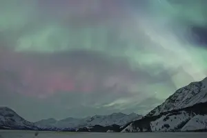 Boreal Prints: A vibrant display of Aurora Borealis fills the northern sky with a rainbow of colors
