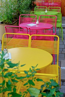 Images Dated 8th October 2024: Vienna, Austria. Colorful table and chairs at local cafe