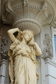 Pillar Prints: Vienna, Austria. Goddess statue on building exterior