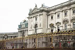 Vienna, Austria - Low angle view of an old world building surrounded by and ornate
