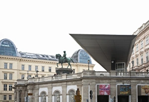Low Angle Prints: Vienna, Austria - Low angle view of a statue of a man on a horse. The statue is situated