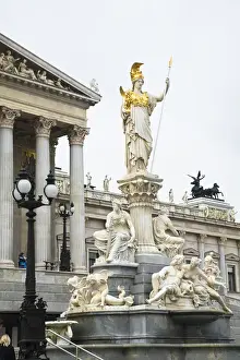 Water Feature Prints: Vienna, Austria - A romanesque statue stands on a dry water feature in front of a