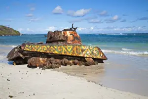 Shoreline Prints: Vieques, Puerto Rico - An old abandoned military tank is sitting on the beach rusting