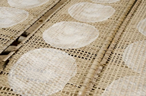 Images Dated 9th March 2012: Vietnam, Cu Chi, Lang Banh Trang. Ultra thin rice paper used in typical