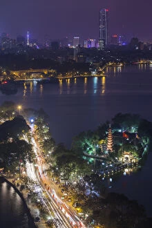 Vietnam Collection: Vietnam, Hanoi, elevated city view by Tay Ho, West Lake, dusk