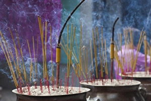 Vietnam Collection: Vietnam, Ho Chi Minh City, Cholon, Chinatown Area, Thien Hau Pagoda, buring incense