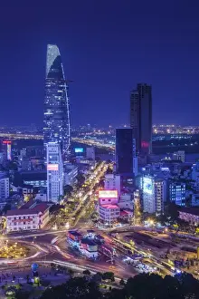 Vietnam Prints: Vietnam, Ho Chi Minh City, elevated city view above Quach Thi Trang Circle, dusk