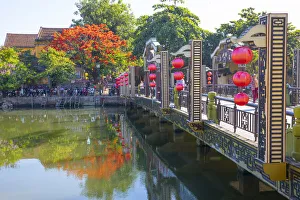 Prints of Vietnam. Hoi An bridge over the river with reflections and silk lamps Asia Prints: Vietnam. Hoi An bridge over the river with reflections and silk lamps