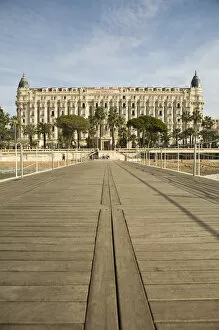 View of Carlton Hotel from beach walk area of Cannes, France