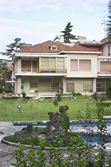 Yard Prints: View of Enver Hoxas palace. Hoxa was the communist dictator of Albania. Military guard