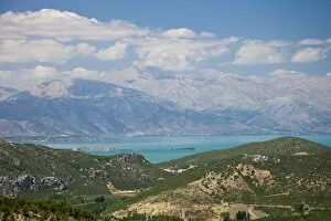 Images Dated 13th June 2007: View of Lake Egirdir beyond hilly green land, Isparta, Turkey