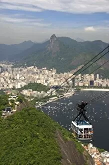 Images Dated 26th January 2007: View of Rio de Janeiro and a cable car on Sugarloaf Peak, Brazil