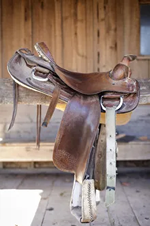Prints of Full view of a Saddle resting on the railing, Tucson, Arizona, United States Images Dated 2018 June: Full view of a Saddle resting on the railing, Tucson, Arizona, United States