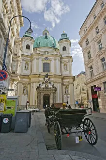 Images Dated 9th April 2007: A view down a street in Viennia Austria looking at St. Peters Church