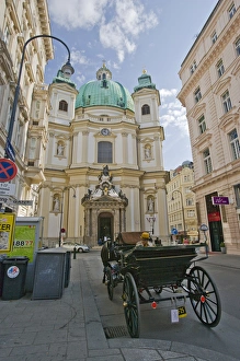 Images Dated 9th April 2007: A view down a street in Viennia Austria looking at St. Peters Church