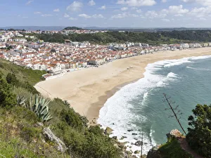 Images Dated 31st March 2017: View over town and beach from Sitio. The town Nazare on the coast of the Atlantic Ocean