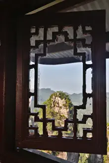 Looking Out Prints: View through window at Moutains of Yellow Stone Village the first national forest park in China