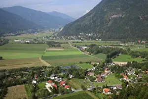 Secluded Prints: Villach, Carinthia, Austria - High angle view of a rural landscape with a residential area