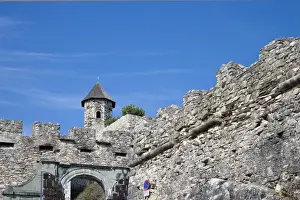 Inti St Clair Prints: Villach, Carinthia, Austria - Low angle view of the battlements of an ancient castle