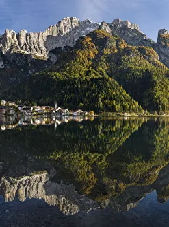 Belluno Prints: Village Alleghe at Lago di Alleghe at the foot of mount Civetta, one of the icons