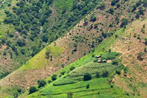 Amhara Prints: Village house and farmland on mountain slope, Simien Mountain, Ethiopia