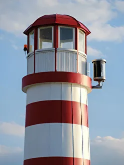 Prints of Village Podersdorf and the shore of Lake Neusiedl. The lighthouse at the harbor, the landmark of Podersdorf. Part of the UNESCO World Heritage Site. Austria, Burgenland Images Dated 2022 May: Village Podersdorf and the shore of Lake Neusiedl