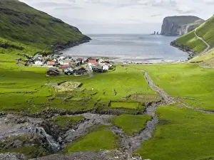 Lonely Prints: Village Tjornuvik. In the background the island Eysturoy with the iconic sea stacks Risin