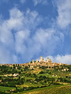 vineyards and the hilltop town of San Gimignano in Tuscany, Italy Credit as: Dennis