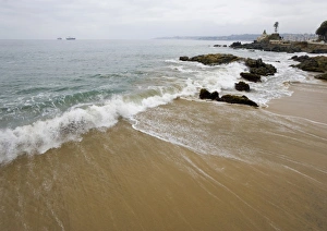 Damp Prints: ViOa del Mar, Chile. South America. Surf at Playa Los Artistas (Artists Beach). Wulff