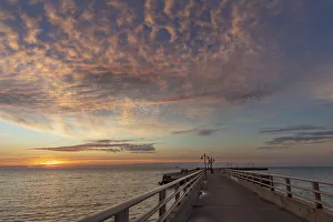 Images Dated 29th December 2020: Vivid sunrise clouds over the Atlantic Ocean from Higgs Beach Pier in Key West, Florida