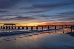 Kauai Prints: Vivid sunrise clouds silhouette Waimea Pier in Kauai, Hawaii, USA