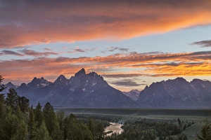 Vivid sunset clouds over the Snake River in Grand Teton National Park, Wyoming, USA