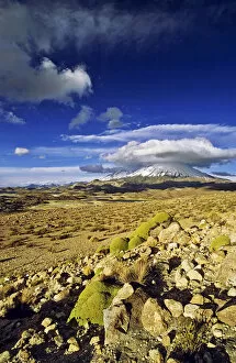 Vulcano Parinacota (6342m) and Pomerape (6286m) Chile during sunset are part of the