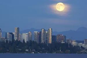Images Dated 30th September 2012: WA, Bellevue, Full moon raising over downtown skyline