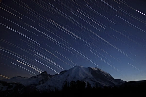 Images Dated 25th August 2011: WA, Mount Rainier National Park, Mount Rainier and star trails, view from Sunrise