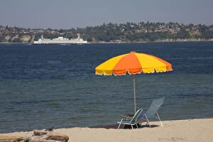 WA, Seattle, Alki Beach, with Seattle ferry boat on Elliott Bay