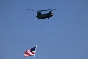 Images Dated 6th August 2006: WA, Seattle, Boeing Chinook Helicopter with American Flag, at SEAFAIR