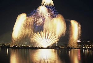 WA, Seattle, Fireworks on July 4th, at Gasworks Park; Space Needle in background