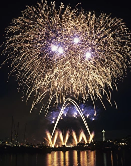WA, Seattle, Fireworks on July 4th, at Gasworks Park; Space Needle in background