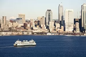 Images Dated 1st February 2007: WA, Seattle, Seattle skyline and Elliott Bay with ferry boat, view from Hamilton Park