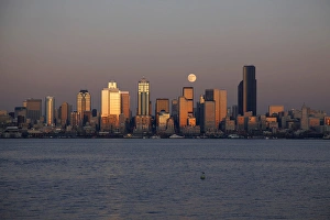 Images Dated 9th December 2011: WA, Seattle, Seattle skyline and Elliott Bay with full moon rising