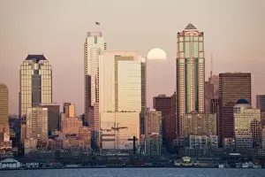 Images Dated 1st February 2007: WA, Seattle, Seattle skyline and Elliott Bay with full moon rising, view from Alki