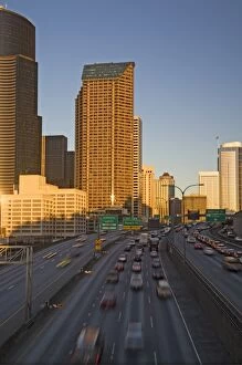 Images Dated 10th February 2006: WA, Seattle, Seattle skyline and Interstate 5 from Yesler Way overpass