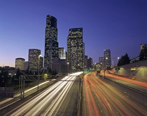 City Center Prints: WA, Seattle, Seattle skyline with traffic on I-5 at night