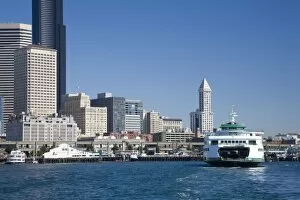 WA, Seattle, Seattle skyline with Washington State ferry and Smith Tower, from Elliott