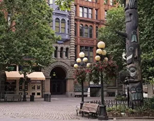 Pioneer Square Prints: WA, Seattle, Totem pole and Pioneer Building at historic Pioneer Square