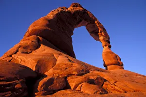 Prints of Warm evening light on Delicate Arch, Arches National Park, Utah, USA Images Dated 2018 December: Warm evening light on Delicate Arch, Arches National Park, Utah, USA