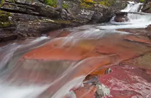 Images Dated 11th July 2010: Water cascades down the red rock of Virginia Creek in Glacier National Park, Montana, USA