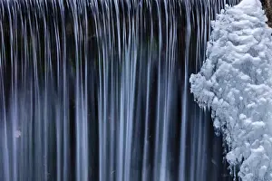 Nelson Prints: Water flowes by ice formation along Falls Creek in winter near Nelson, British Columbia